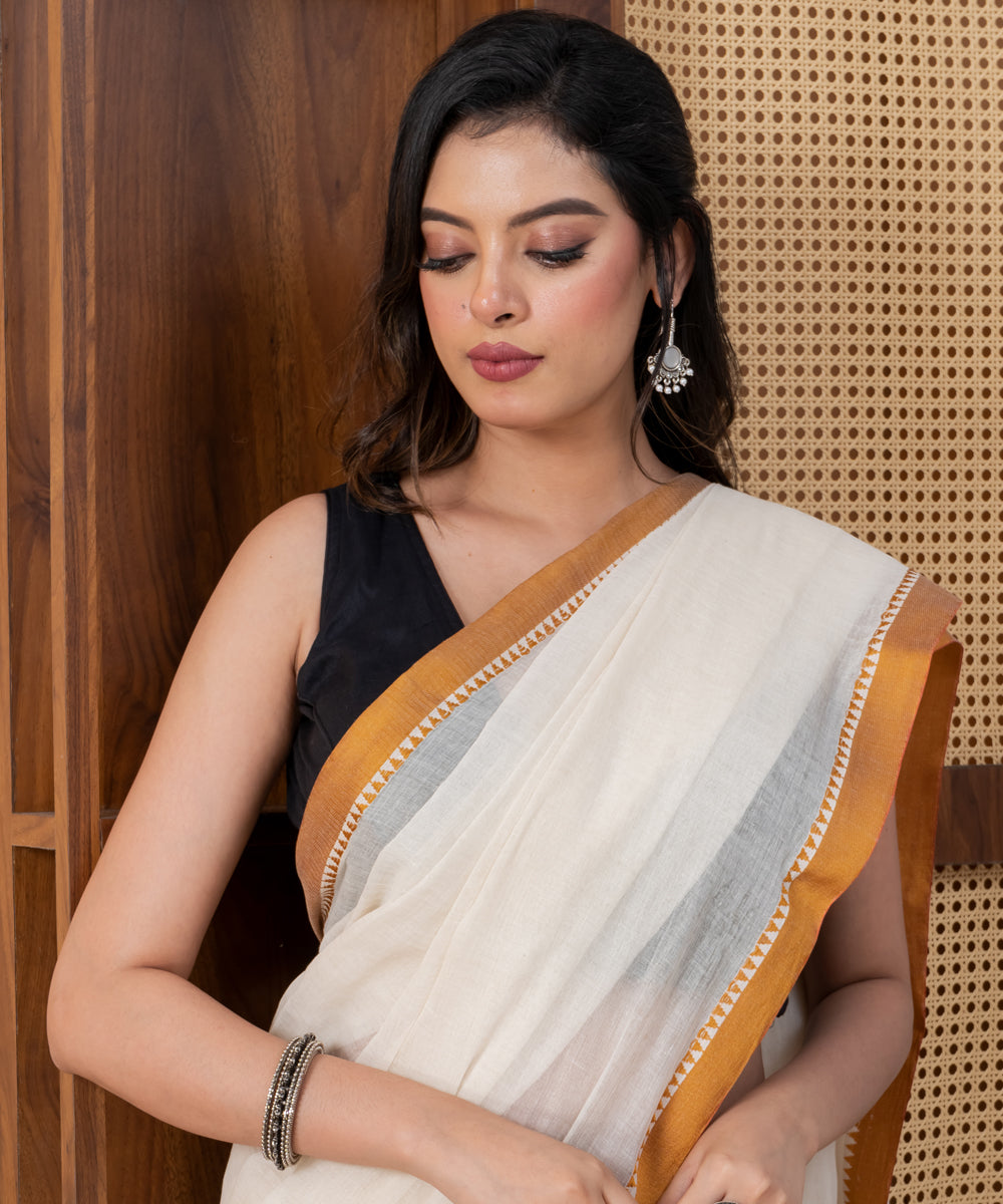 Cream golden border cotton handloom shantipuri saree