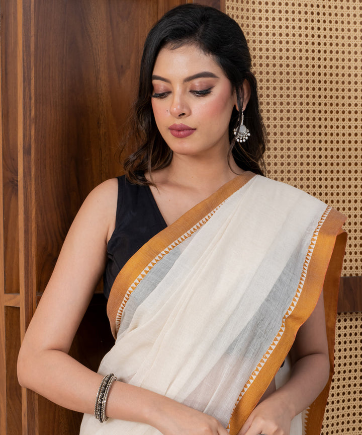 Cream golden border cotton handloom shantipuri saree