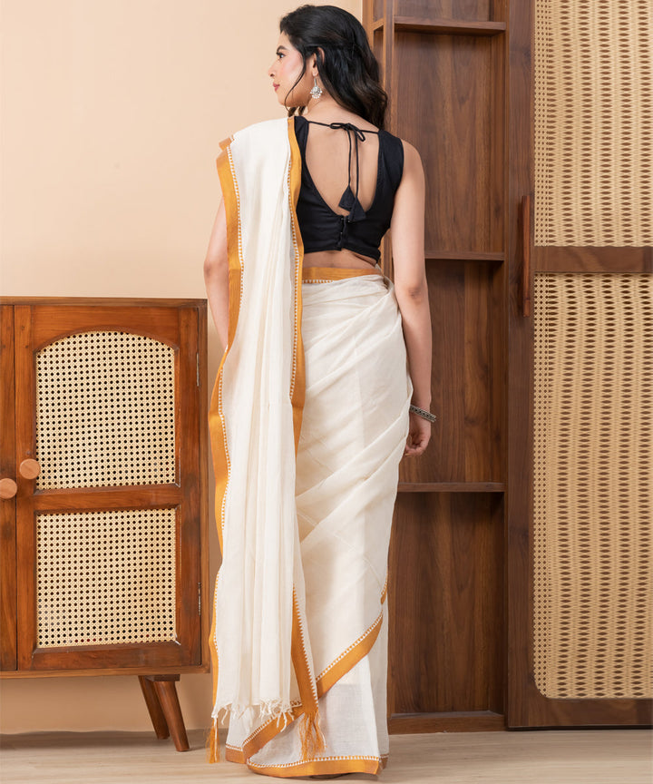 Cream golden border cotton handloom shantipuri saree