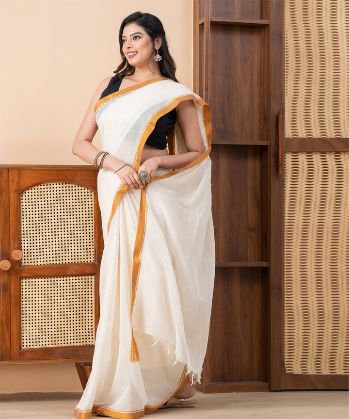 Cream golden border cotton handloom shantipuri saree