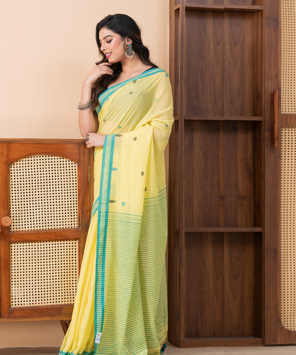 Yellow light yellow mul cotton handloom jamdani saree with tassels