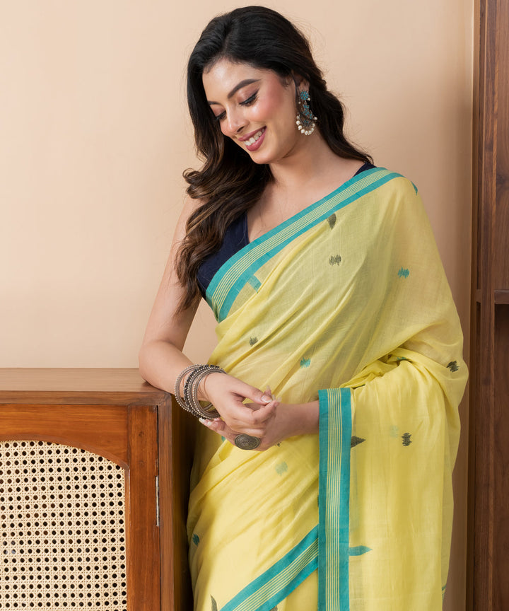 Yellow light yellow mul cotton handloom jamdani saree with tassels