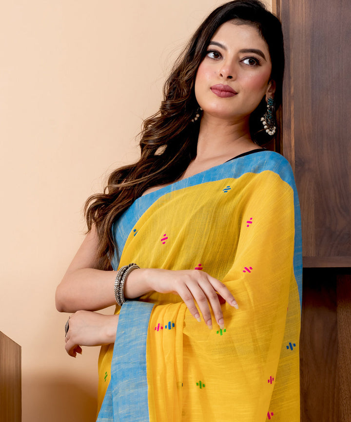 Yellow sky blue border cotton handloom jamdani saree with tassels