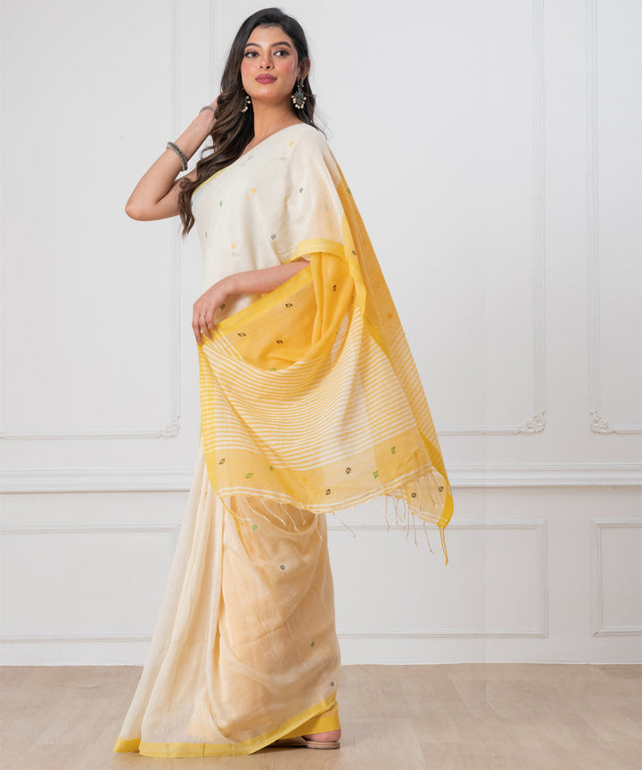 White yellow mul cotton handloom jamdani saree with tassels
