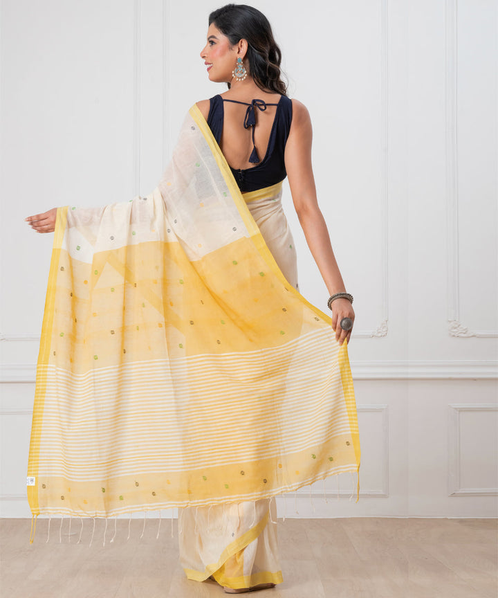 White yellow mul cotton handloom jamdani saree with tassels