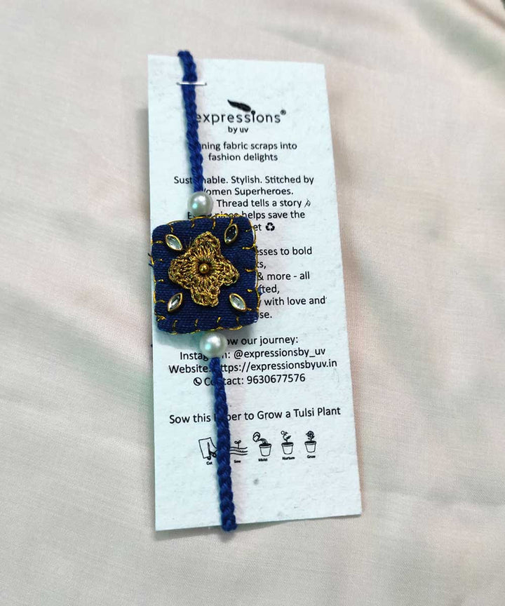 Blue handcrafted thread work upcycled fabric rakhi
