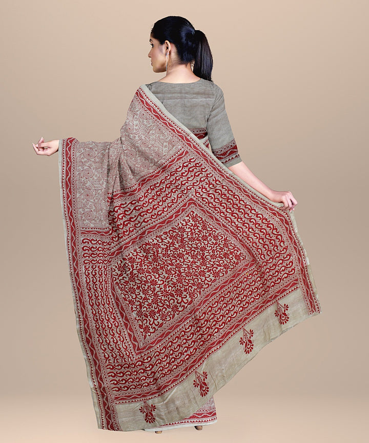 Beige red hand embroidered kantha stitch tussar silk saree