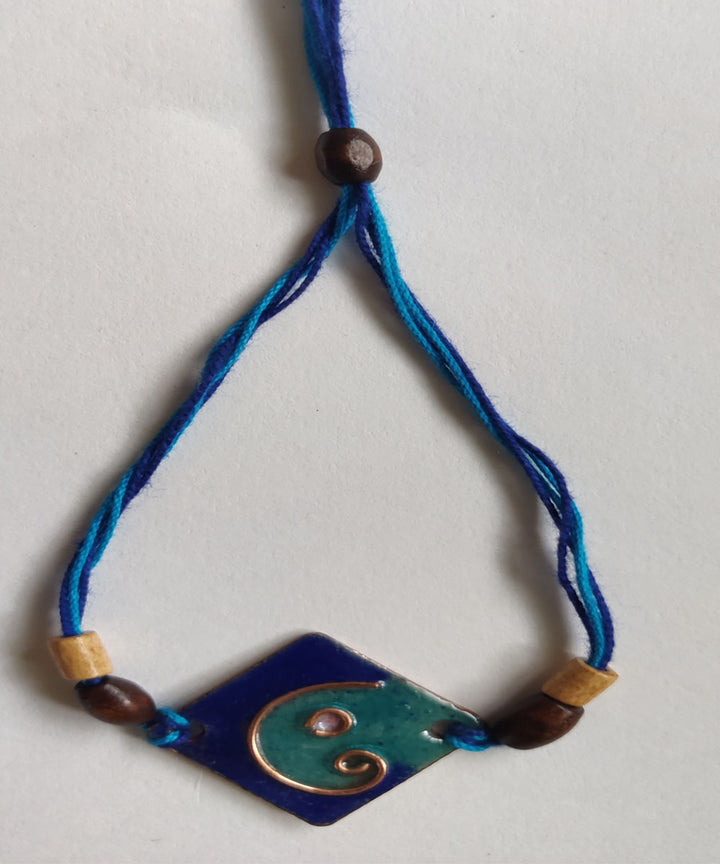 Light dark blue handmade copper enamelling rakhi