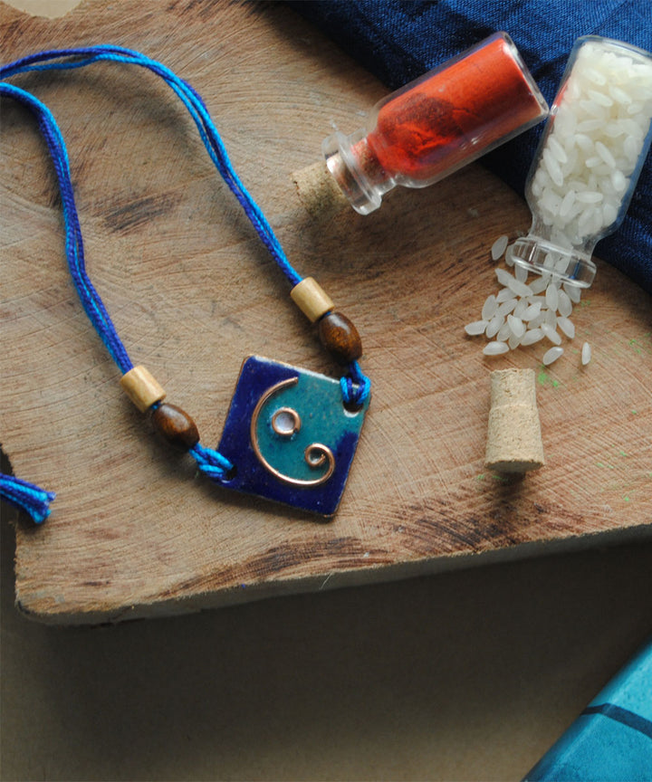 Light dark blue handmade copper enamelling rakhi