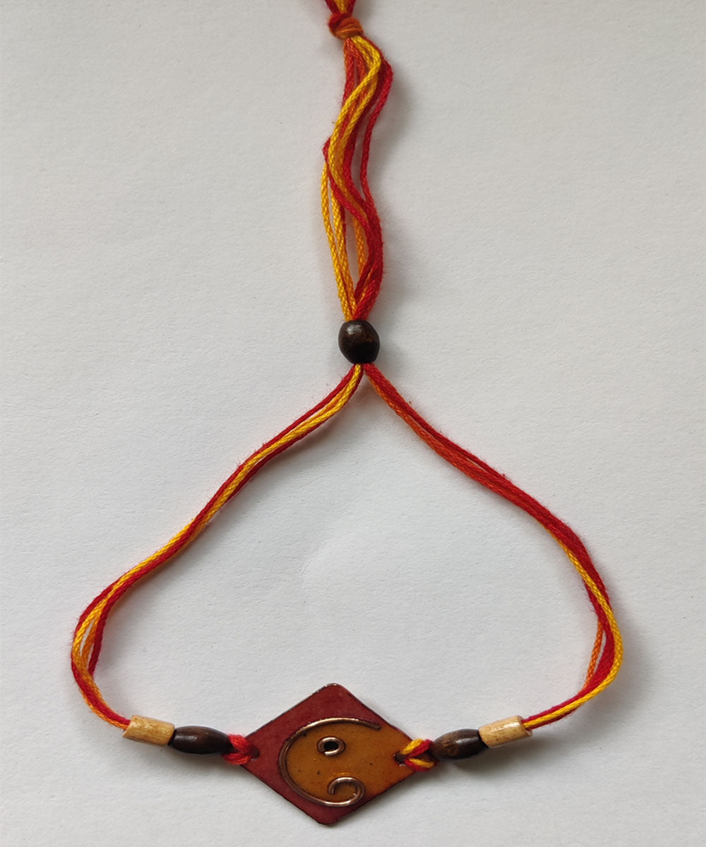 Yellow orange handmade copper enamelling rakhi