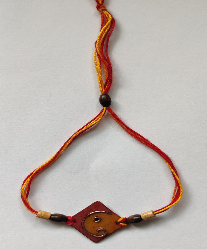 Yellow orange handmade copper enamelling rakhi