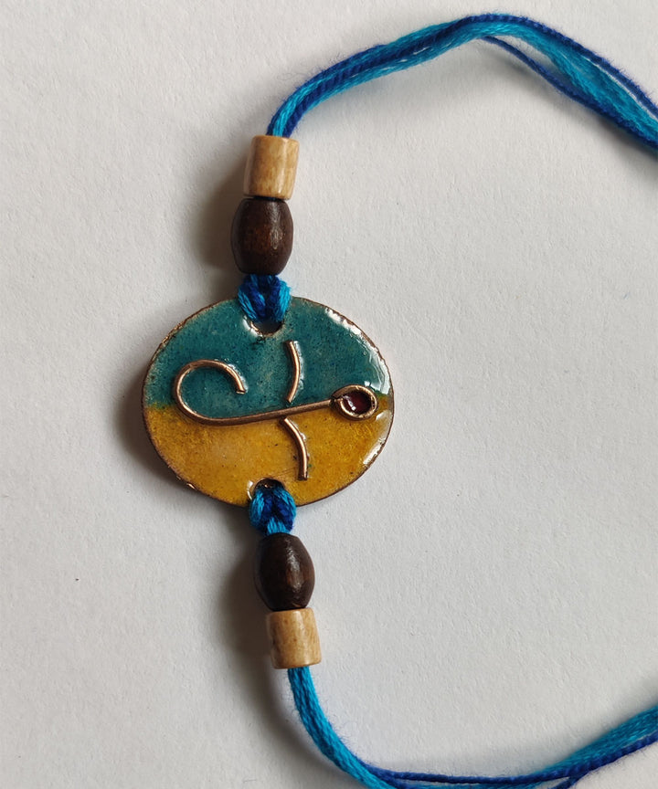 Blue yellow handmade copper enamelling rakhi