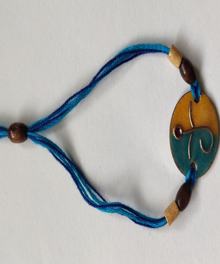 Blue yellow handmade copper enamelling rakhi