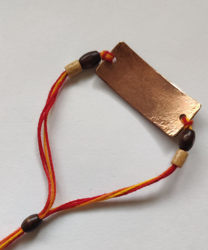 Orange copper enamelling handmade rakhi