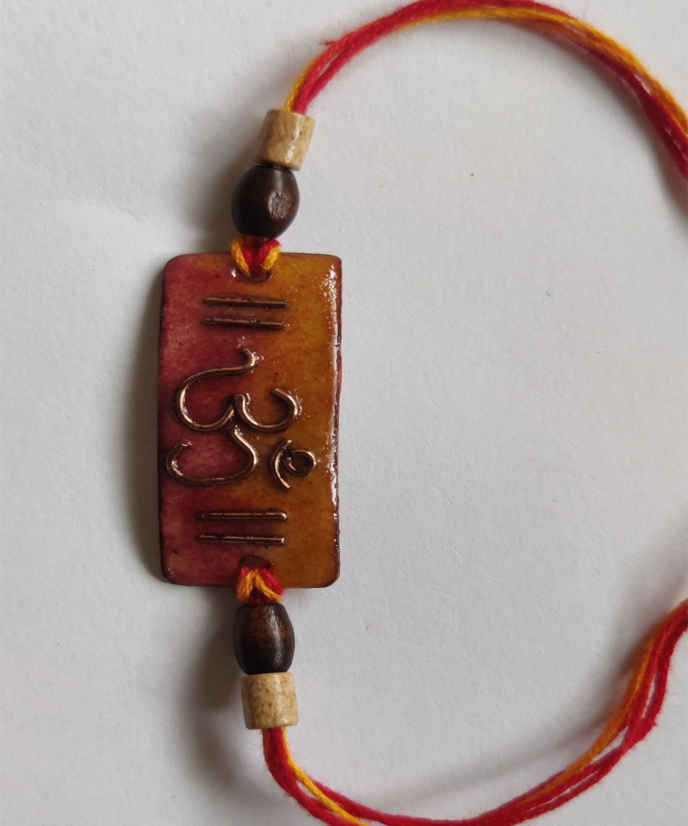 Orange copper enamelling handmade rakhi
