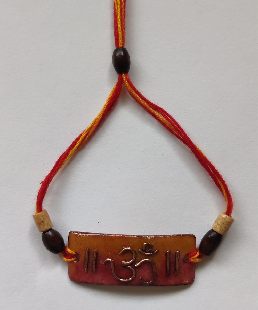 Orange copper enamelling handmade rakhi