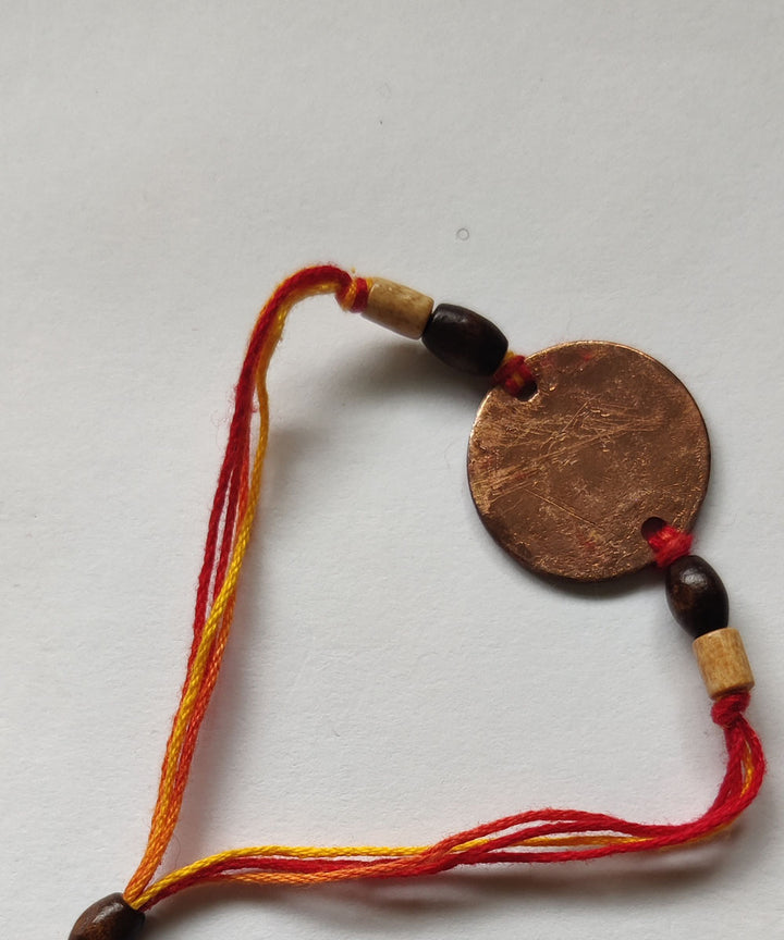 Orange copper handmade enamelling rakhi