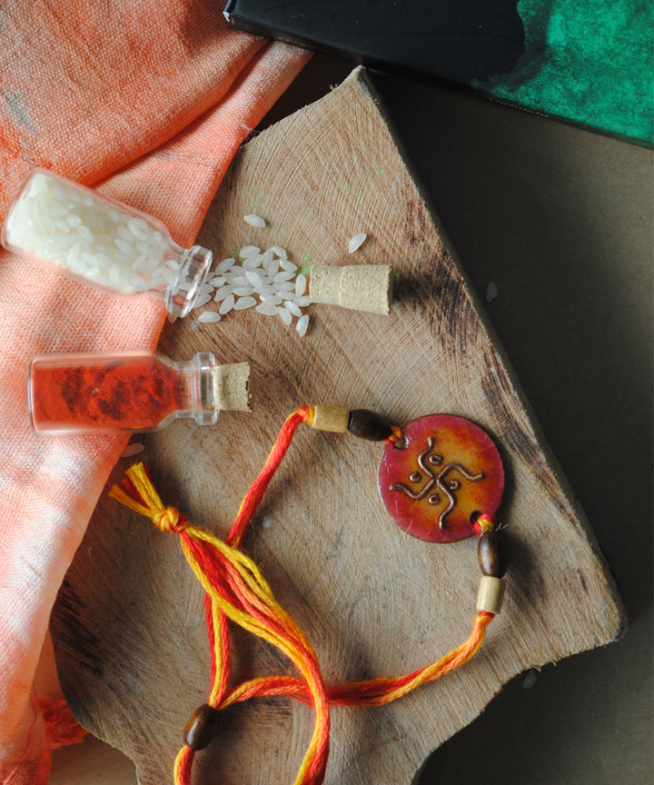 Orange copper handmade enamelling rakhi