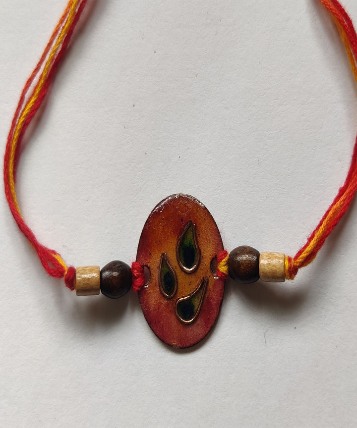 Orange copper handmade enamelling rakhi