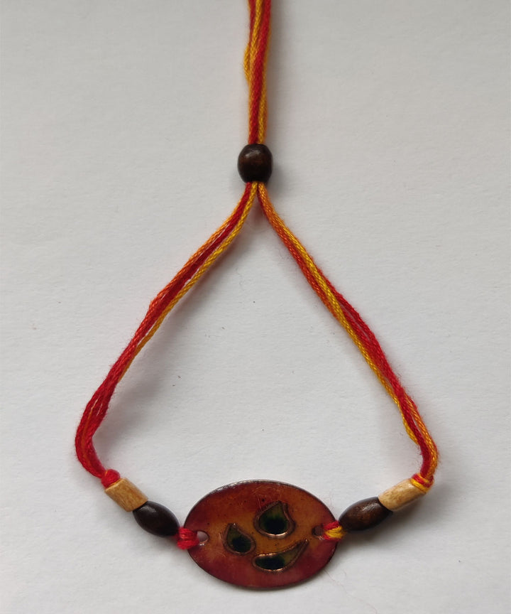 Orange copper handmade enamelling rakhi