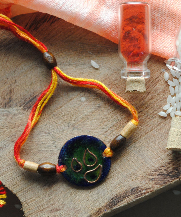 Blue handmade enamelling copper rakhi