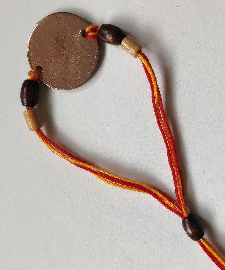 Orange handmade enamelling copper rakhi