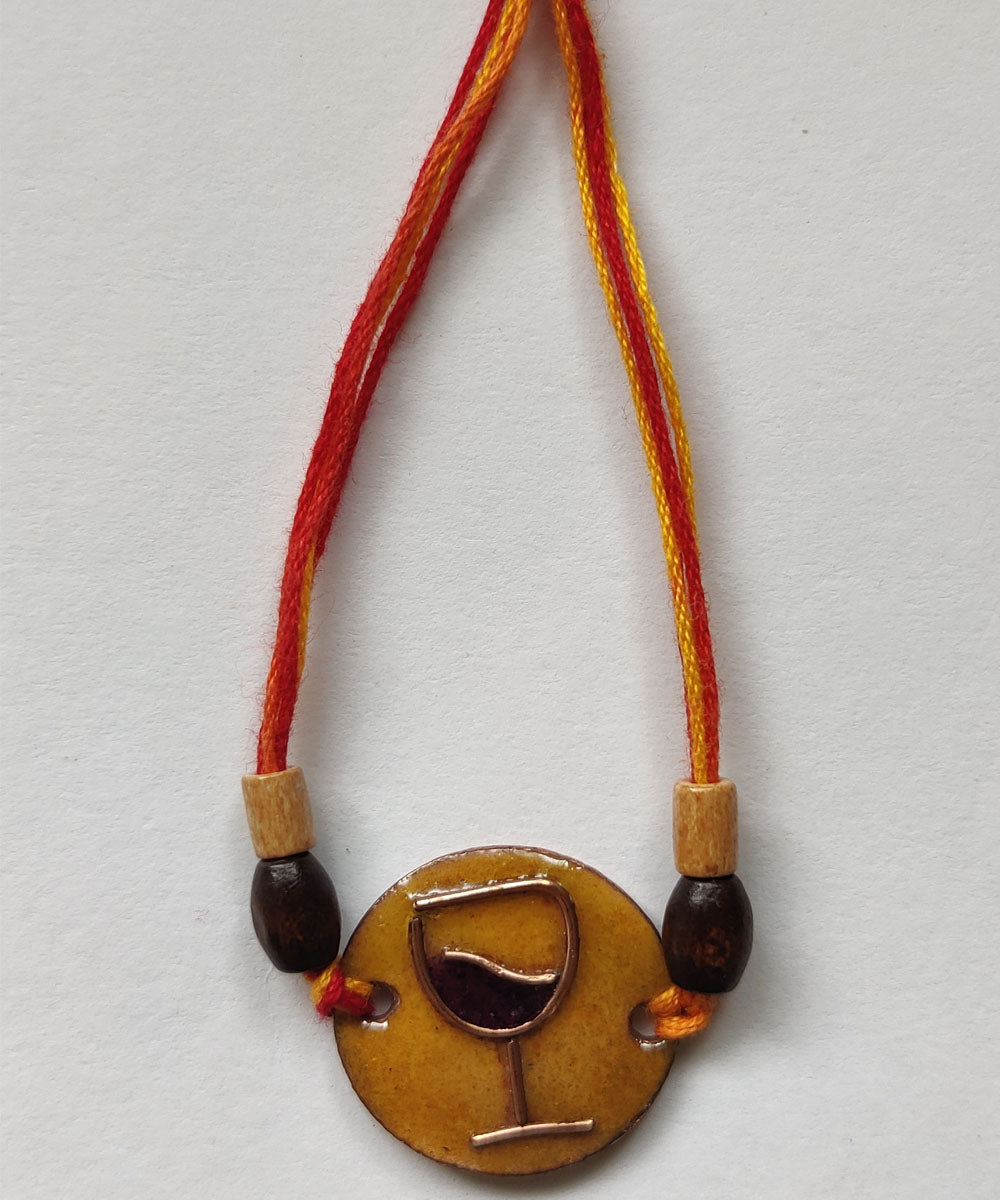 Orange handmade enamelling copper rakhi