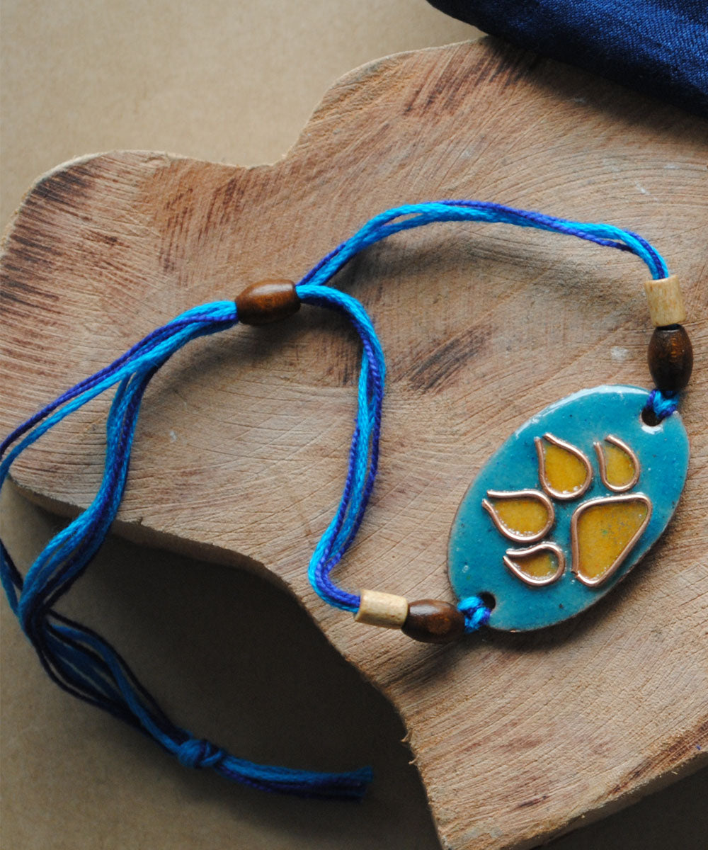 Blue yellow hand crafted copper enamelling rakhi