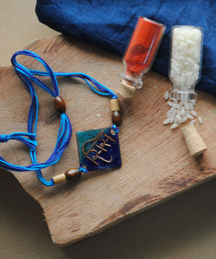Blue hand made copper enamelling rakhi