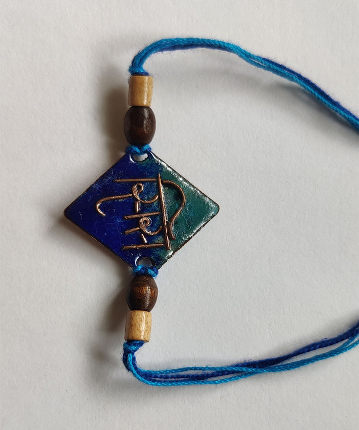 Blue hand made copper enamelling rakhi