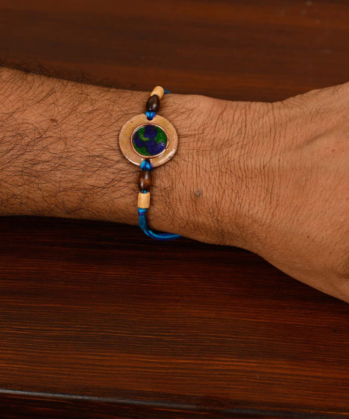Brown handmade copper enamelling rakhi