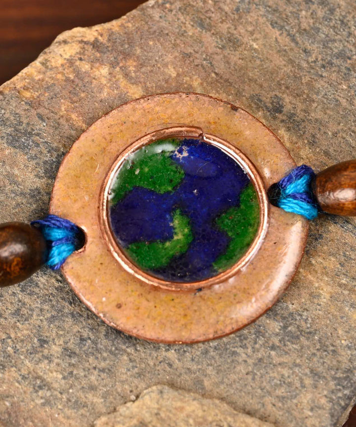 Brown handmade copper enamelling rakhi