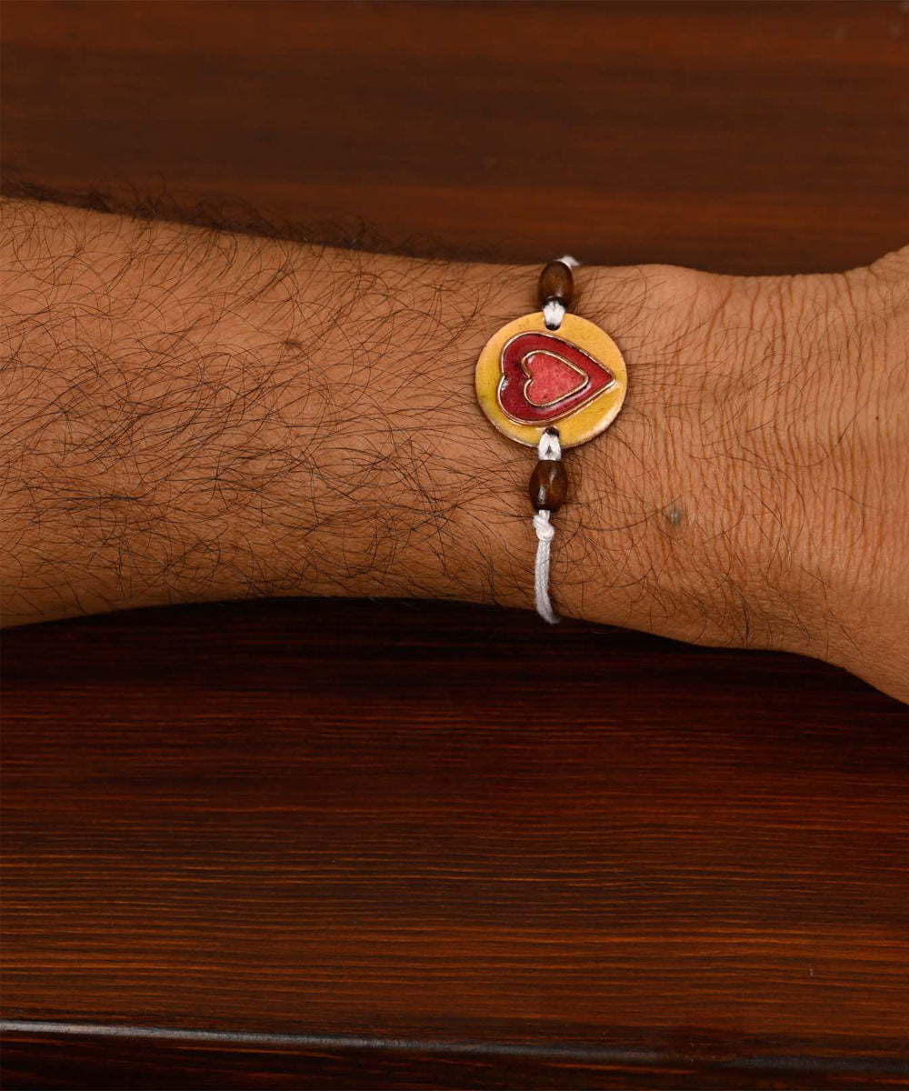 Red handmade copper enamelling rakhi