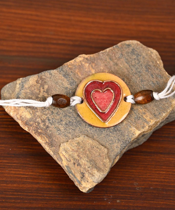 Red handmade copper enamelling rakhi
