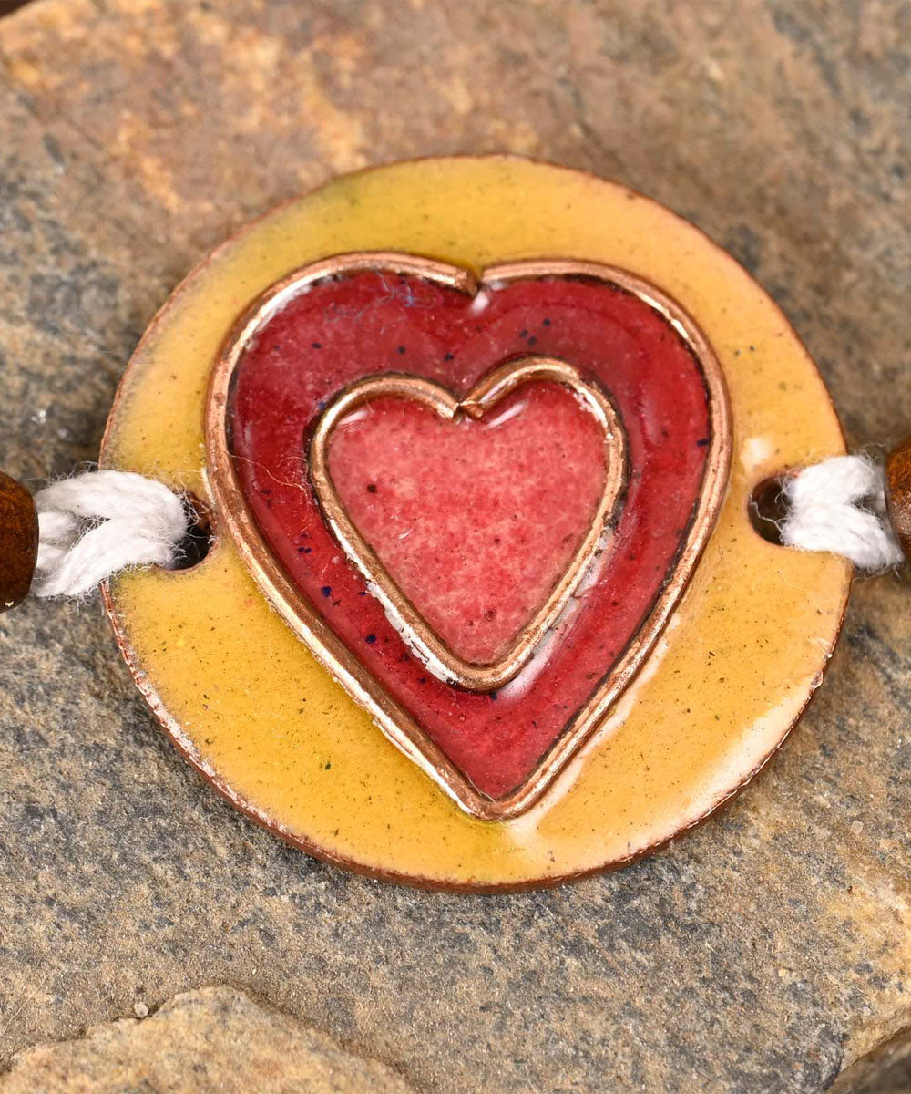 Red handmade copper enamelling rakhi