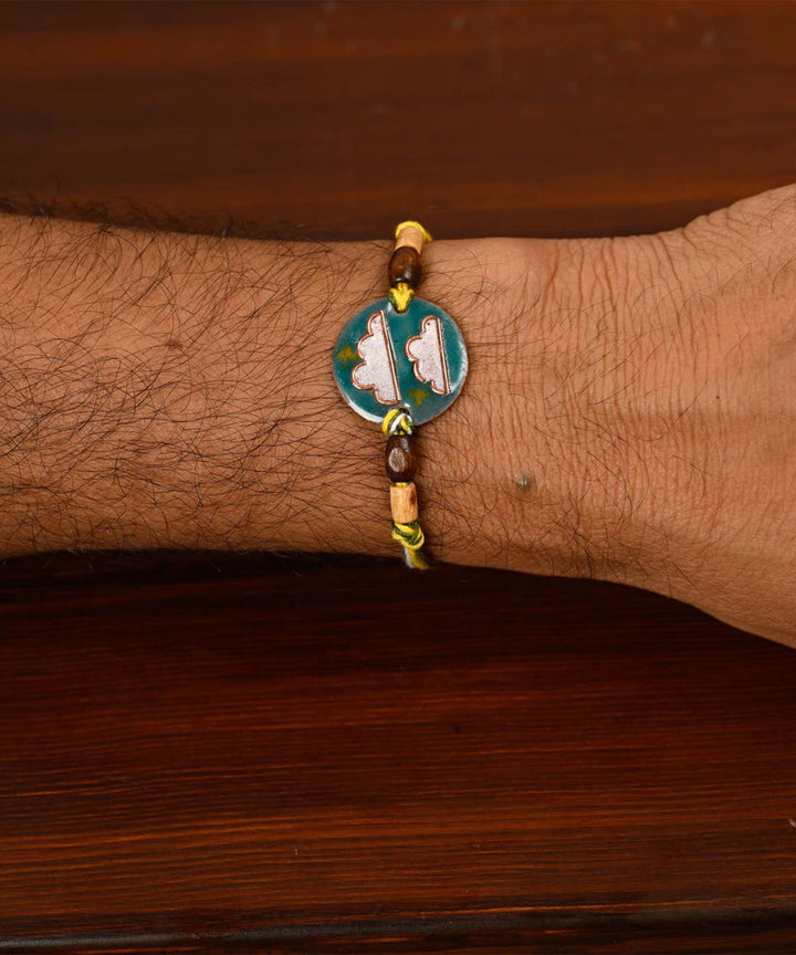 Blue enamelling copper handmade  rakhi