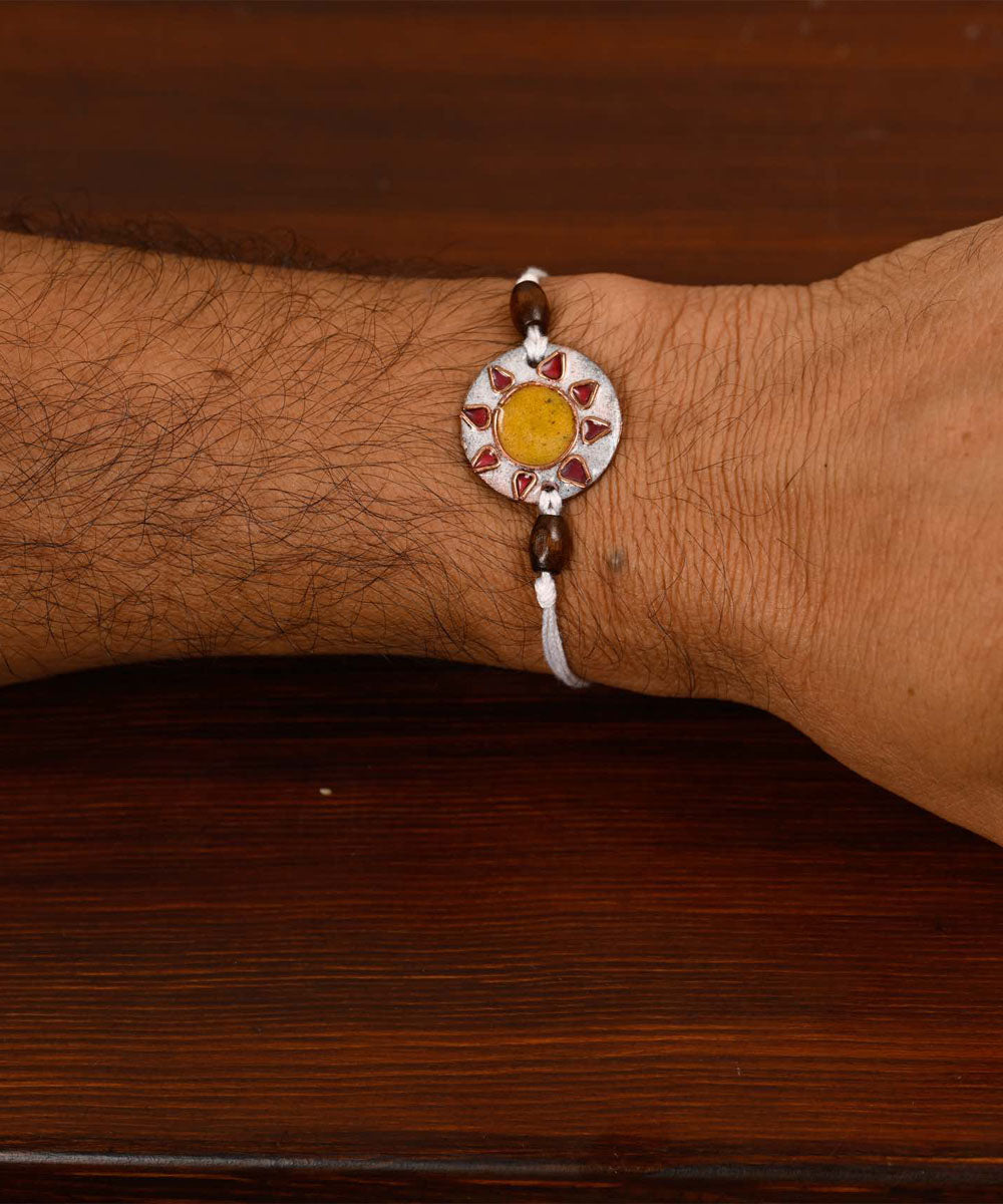 White handmade copper enamelling rakhi