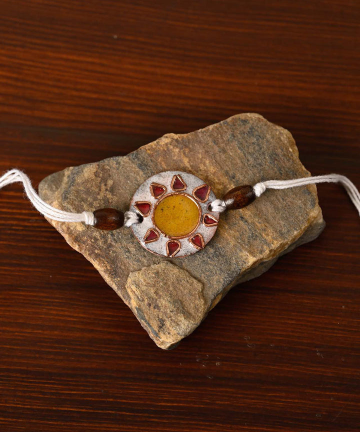 White handmade copper enamelling rakhi