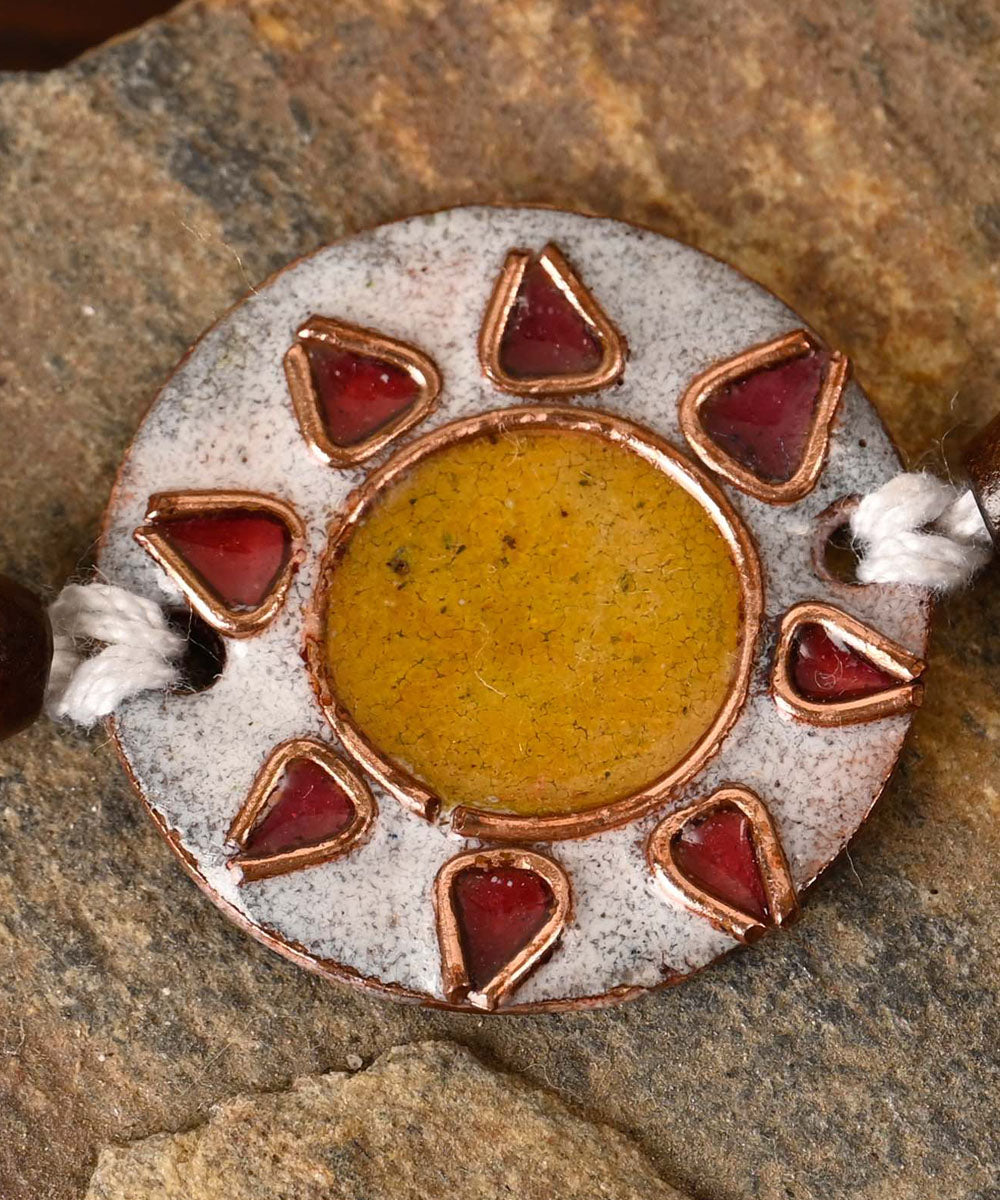 White handmade copper enamelling rakhi