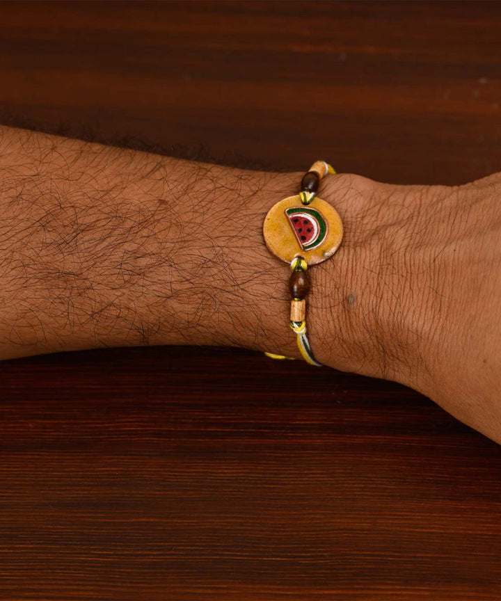 Red handmade enamelling copper rakhi
