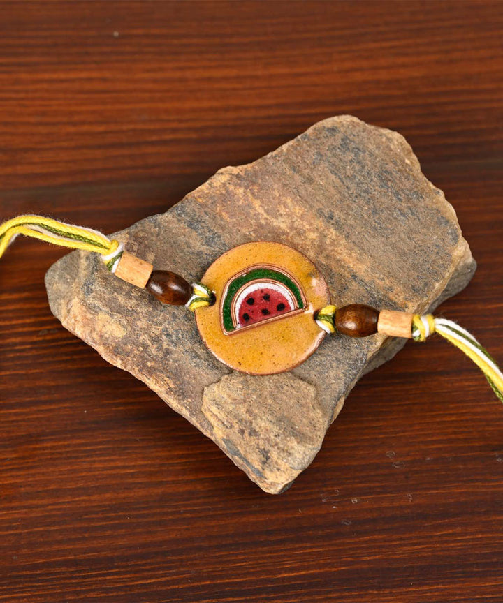 Red handmade enamelling copper rakhi