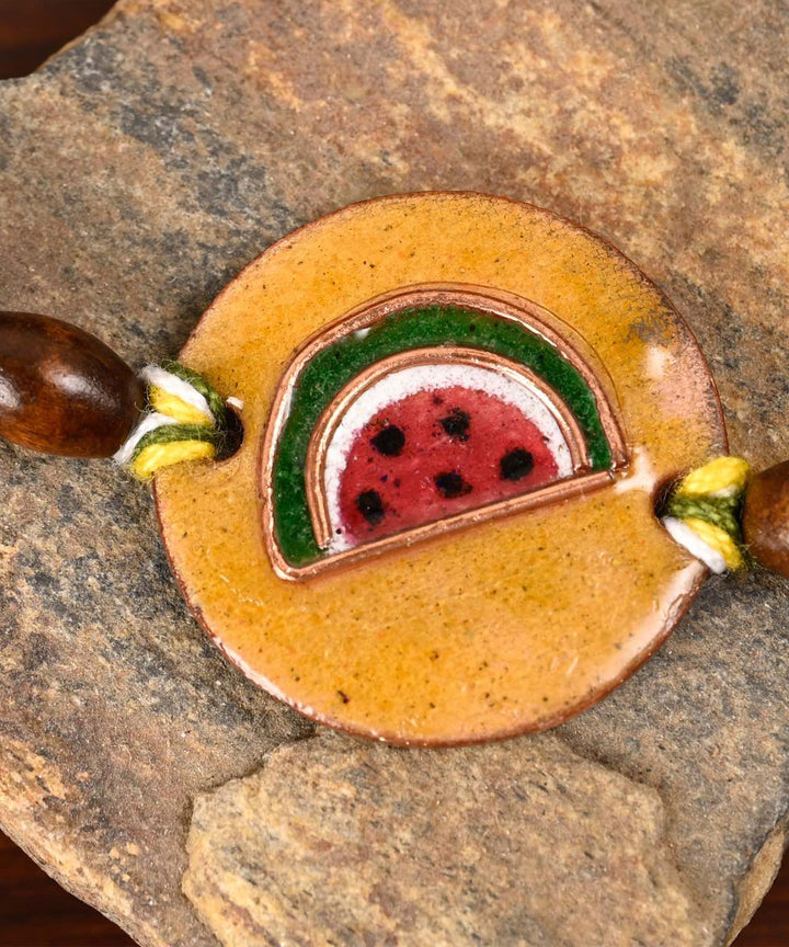 Red handmade enamelling copper rakhi