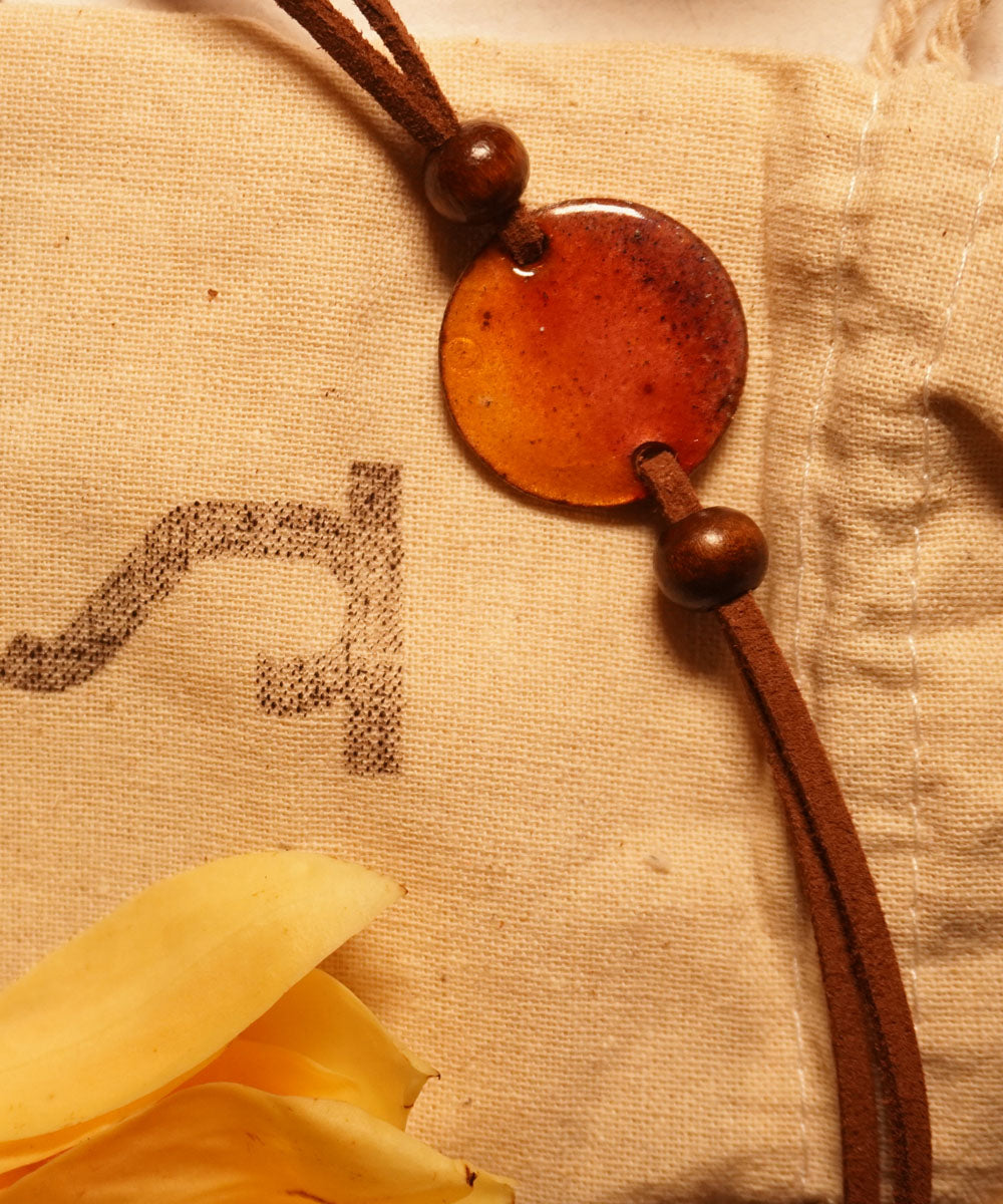 Yellow handmade enamelling copper rakhi