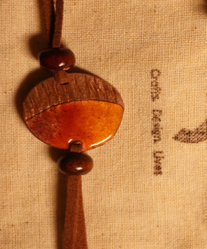 Yellow brown handmade copper enamelling rakhi