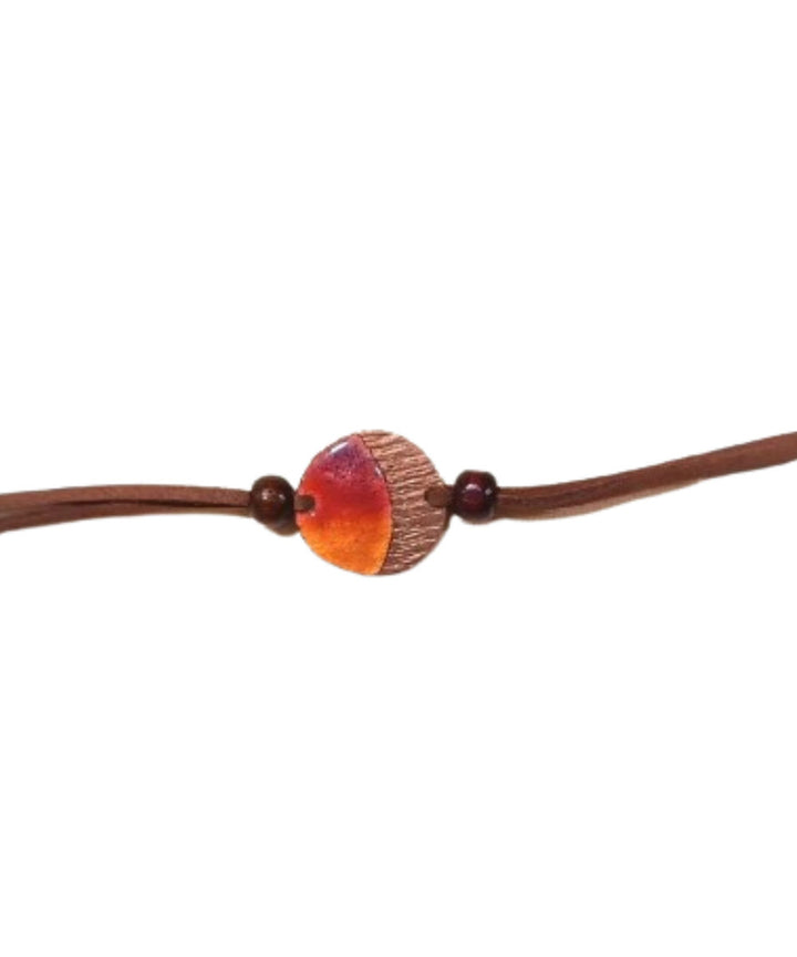 Yellow brown handmade copper enamelling rakhi