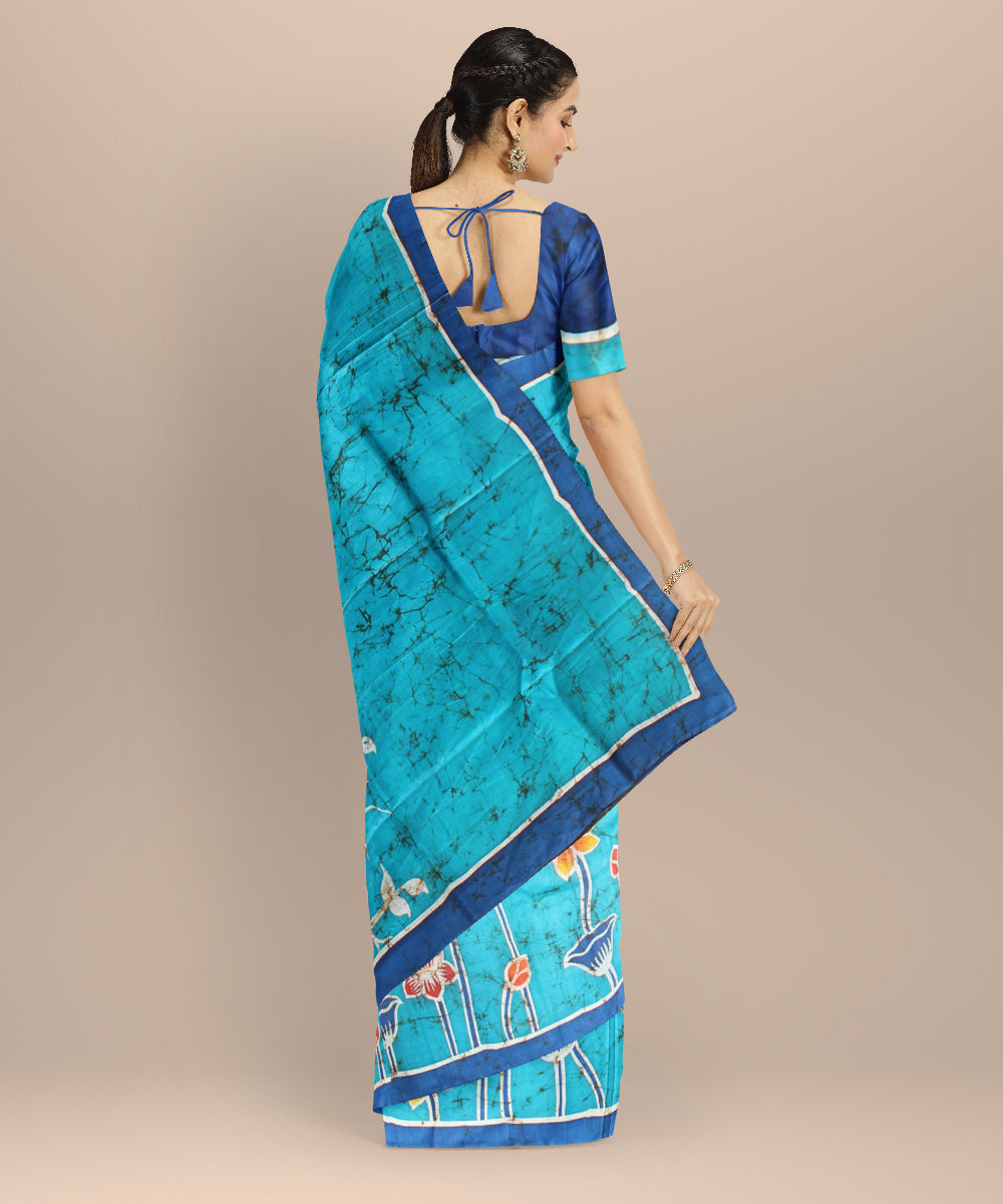 Sky blue navy blue silk hand painted batik print saree