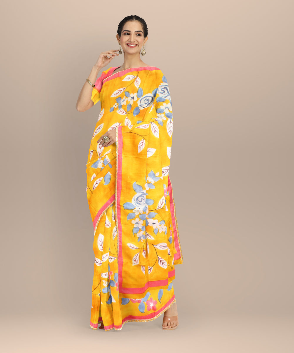Mustard red silk hand painted batik print saree