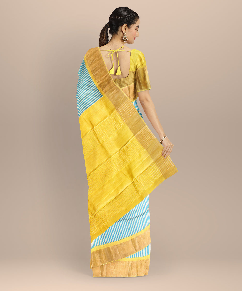 Sky blue mustard tussar silk handloom hand printed saree