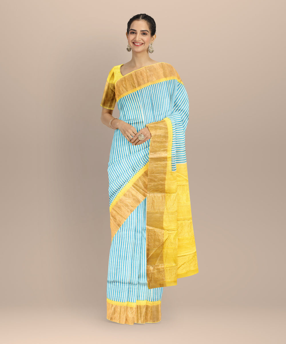 Sky blue mustard tussar silk handloom hand printed saree
