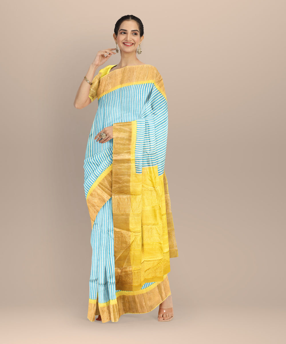 Sky blue mustard tussar silk handloom hand printed saree